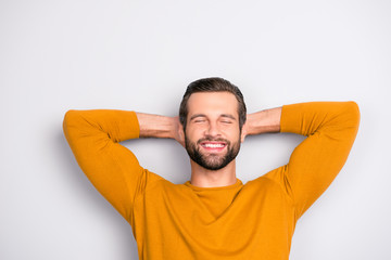 Close up portrait of handsome bearded cheerful joyful excited amazed guy with closed eyes toothy beaming smile waiting for the weekend isolated on gray background