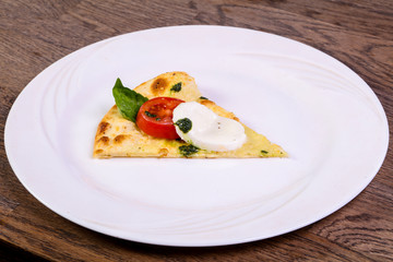 Pizza Caprese with basil