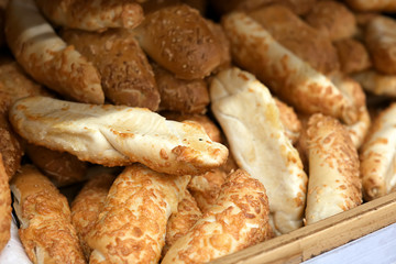 Tasty fresh bakery with cheese on display in shop