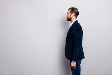 Profile side half-faced view photo of concentrated serious pondering pensive attractive handsome virile masculine mature rich economist, dark blue blazed jeans isolated on gray background copy-space