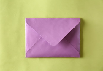 Mail envelope on color background
