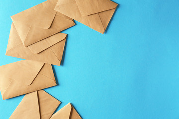 Mail envelopes on color background