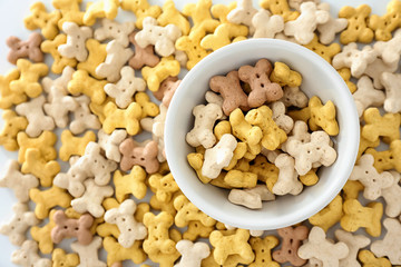 Bowl with pet food, top view