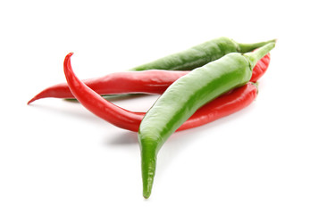 Different chili peppers on white background