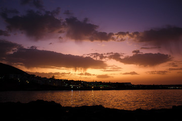 view of the sea city by the sea at sunset