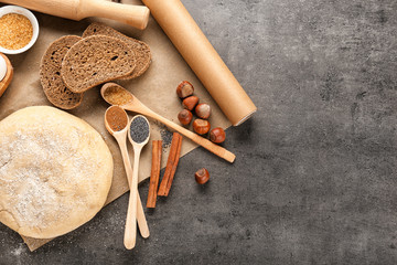 Ingredients for preparing bakery on grey table