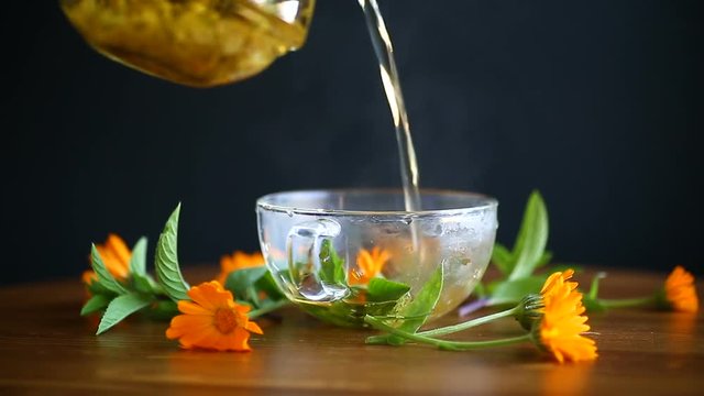 fresh hot tea with calendula