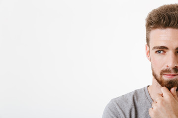 Thoughtful concentrated young man