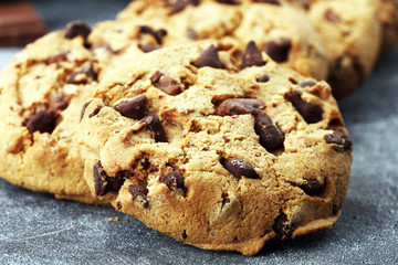 Chocolate cookies on rustic table. Chocolate chip cookies