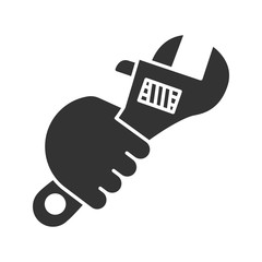 Hand holding wrench glyph icon