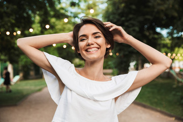 Smiling happy girl looking at camera