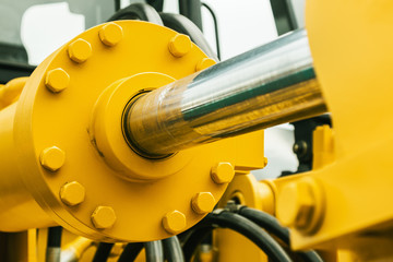 pipes and the hydraulic system of the tractor or excavator.Focus on the left side of the frame on...