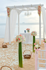 Beach Wedding Ceremony on the beach with sea and sky in romantic