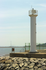 white lighthouse against the sky