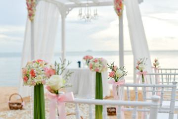Beach Wedding Ceremony on the beach with sea and sky in romantic