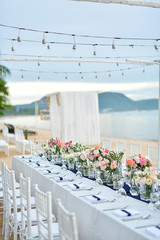 Beach Wedding Ceremony on the beach with sea and sky in romantic