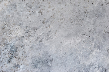 Gray stone. Empty old concrete background. The texture of the surface of the stone.