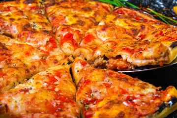 Slice of pizza cheese crust seafood topping sauce. with bell pepper vegetables delicious tasty fast food italian traditional and soft drink carbonated fresh on wooden board table classic and smoke