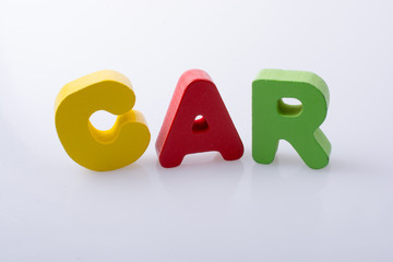 the word CAR written with colorful letter