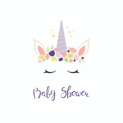 Hand drawn vector illustration of a cute funny unicorn face cake decoration with flowers, lettering quote Baby shower. Isolated objects on white background. Flat style design. Concept children print.