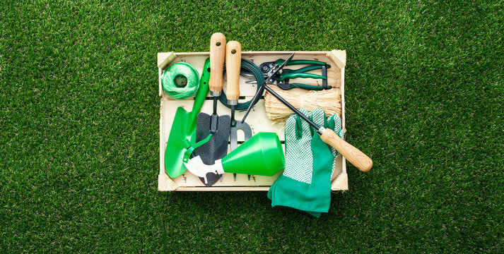 Crate with gardening tools