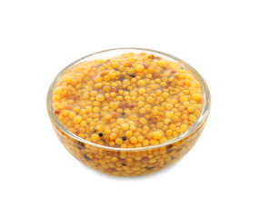 Dijon mustard in glass bowl on white background