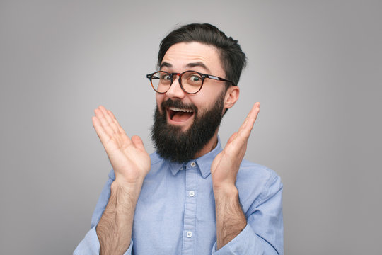 Excited hipster in surprise