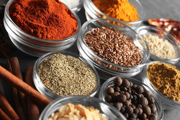 Bowls with various spices on table