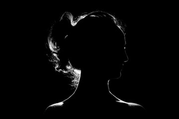 Silhouette of a beautiful girl on a black background