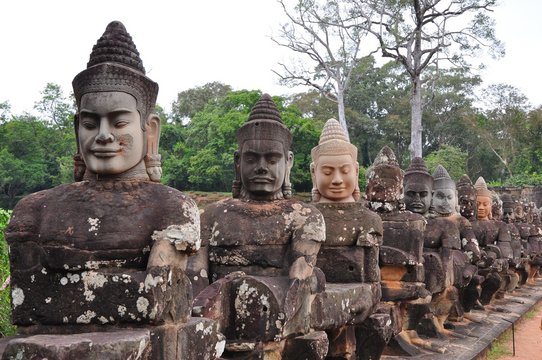 Smiling Buddhas near Angkor Wat in Siem Reap, Cambodia