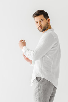 Man In Linen White Shirt Looking At Camera Isolated On Grey Background