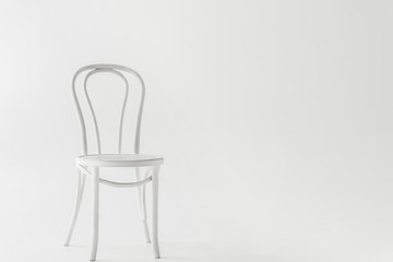 front view of white chair isolated on grey background
