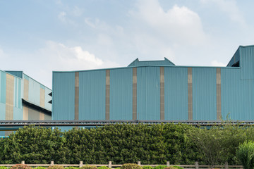 Obraz premium Factory buildings, pipes and industrial structures