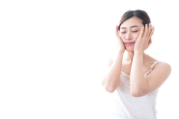 Naklejka premium スキンケアをする若い女性