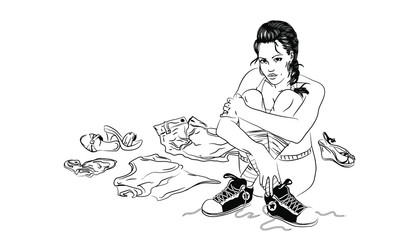 girl sits and smiles in a pile of clotches, a lot of things around, a day of washing, a choice of clothes