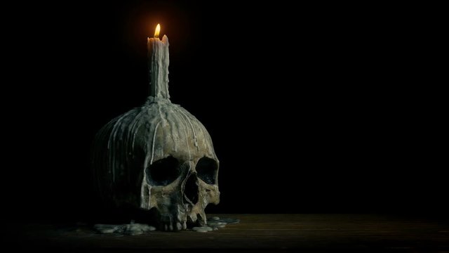 Old Skull With Candle On It