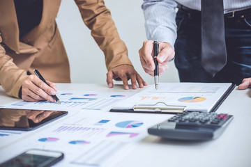 Business people discussion, Executive team discussing the charts and graphs working in business strategy and financial plan to investment profit
