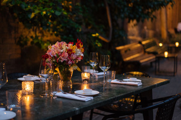Elegantly set table at beautiful patio