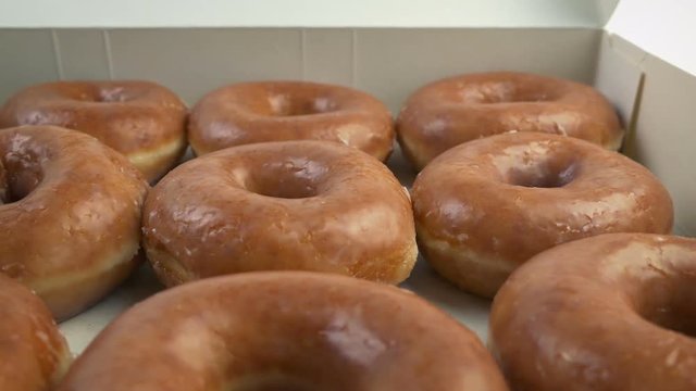 Passing Box Of Donuts