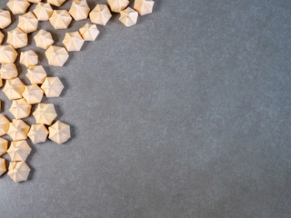 Colorful meringues, arranged on the side of the page with a place for text