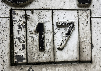 Written Wording in Distressed State Typography Found Number Seventeen, 17