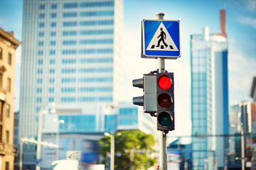 Trafficlights outdoors in early morning with green light in the city