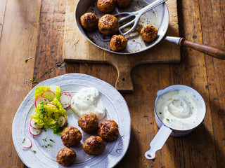 Köttbullar. Beef meatballs with sour cream