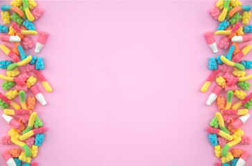 Gummy bears on pink background