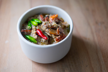 Crab stew in white bowl