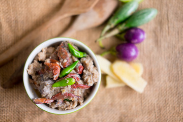 Thai style crab stew in coconut milk with fresh vegetable