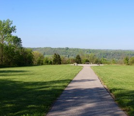Fototapeta na wymiar The long walkway with a view of the countryside horizon. 