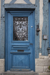 2018-06-12 Normandy France.  Old door of a traditional house  in medieval village of Beaumont en Auge in Normandy France