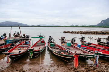 Fototapeta na wymiar Fishing boat pier of southern Thailand in Khanom, Nakhon Si Thammarat