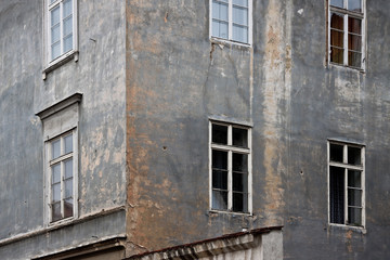 Old weathered facade of building in prague europe